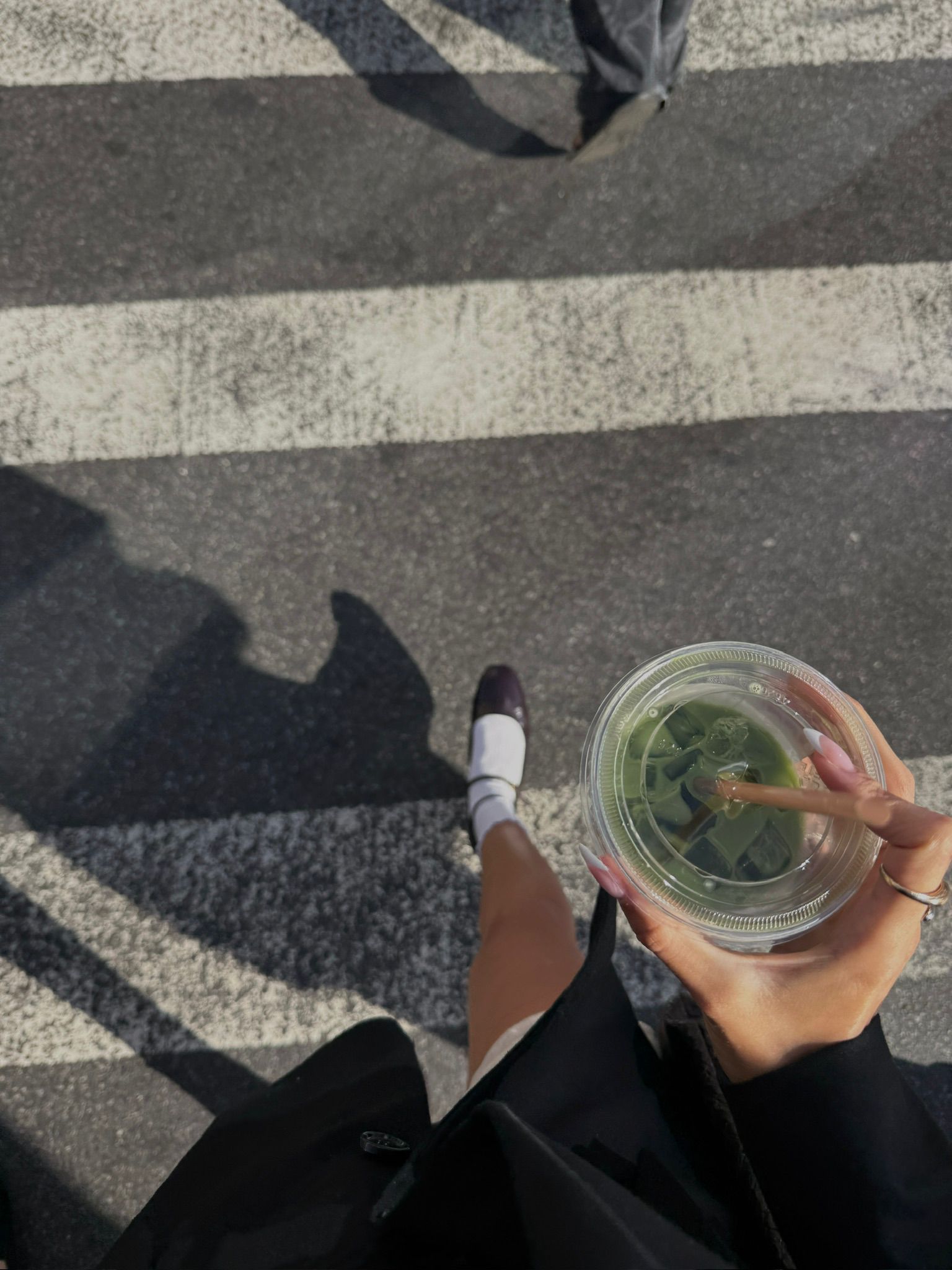 MADÉ lifestyle matcha on NYC crosswalk